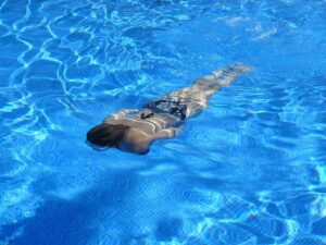 Victory in the Pool: GCHS Girls’ Swimming Dominates Hays Invite!