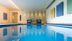 9 Stunning Indoor Swimming Pools That Turn Hotels Into Dreamy Escapes